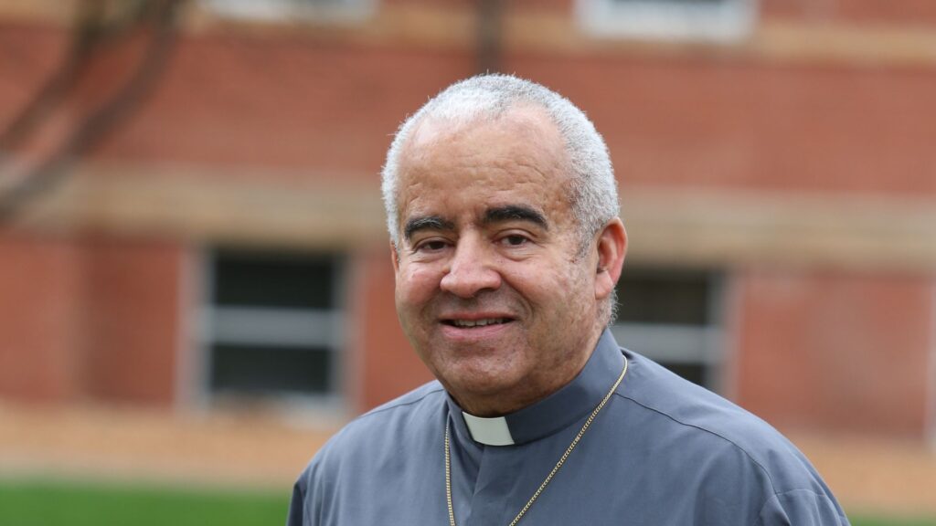 catholic deacon smiling