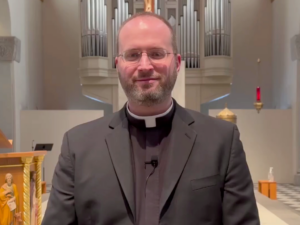 fr evan koop priests all black white collar