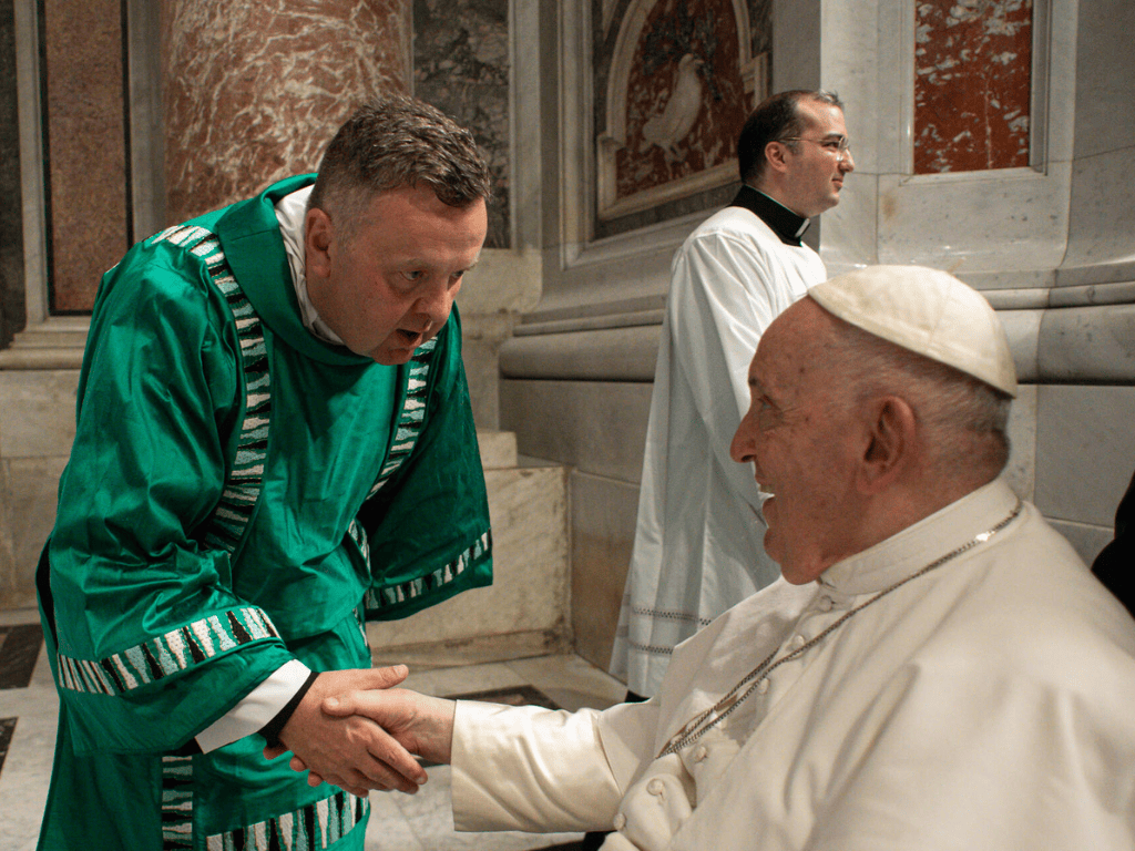 Deacon Hjalmar Gudjonsson greets Holy Father Pope Francis at St. Peter's Basilica in Rome. Gudjonsson, a seminarian from The Saint Paul Seminary, served as a deacon alonside Francis during a special Mass for grandparents and the elderly on July 23.