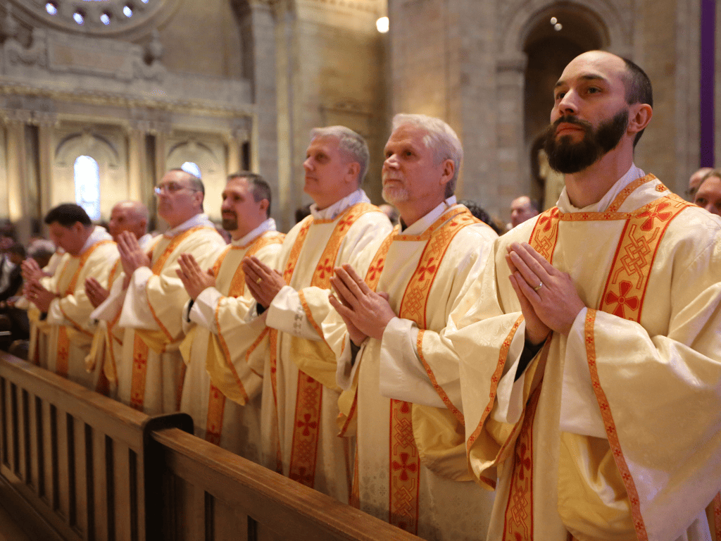 saint paul seminary deacon candidates being ordained