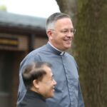 catholic deacon smiling outside the saint paul seminary