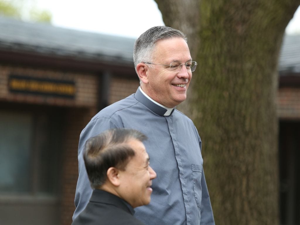 catholic deacon smiling outside the saint paul seminary