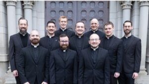 fr ryan sustacek and classmates