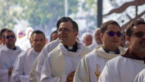 happy catholic priests who prioritize mental health in a procession