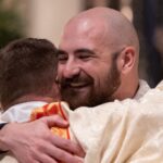 fr nick vance hugs his father deacon chris vance