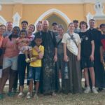 fr scott padrnos with fellow missionaries and locals in Cambodia