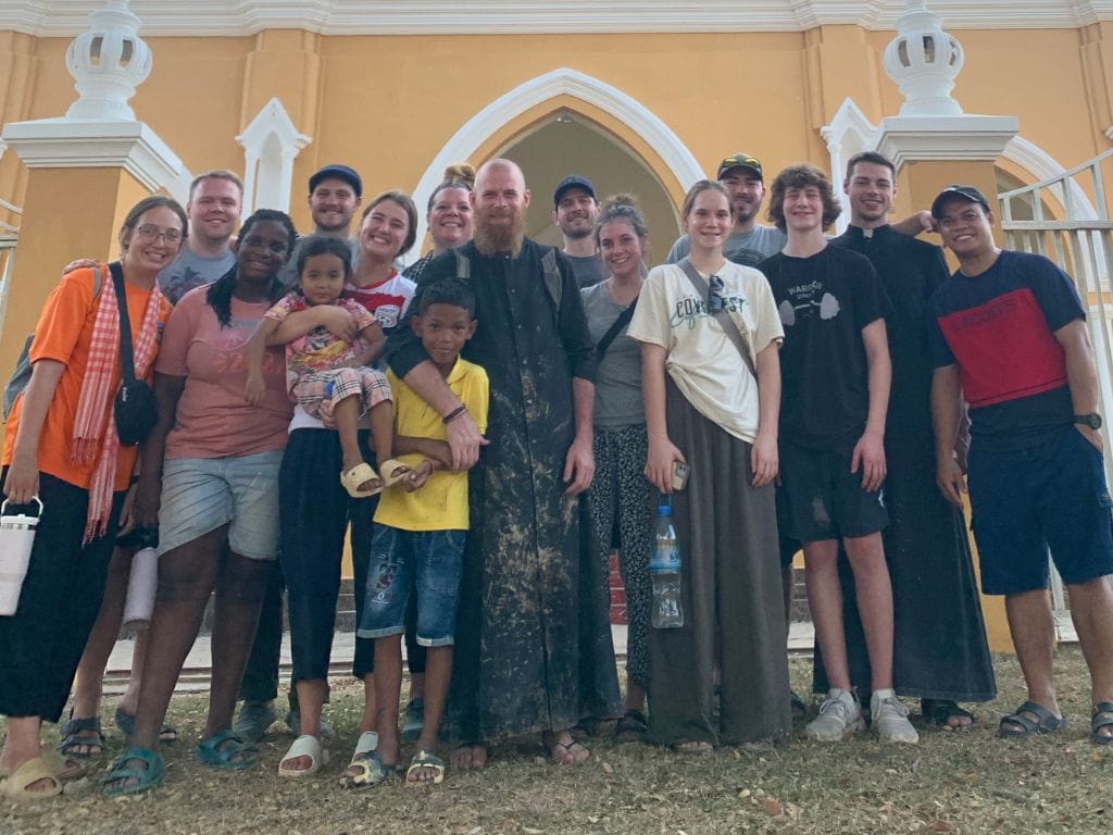 fr scott padrnos with fellow missionaries and locals in Cambodia