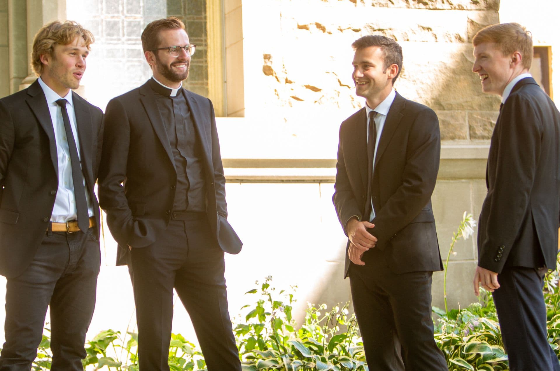 Catholic seminarians talking and laughing at the saint paul seminary