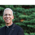 priest smiling