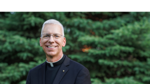 priest smiling
