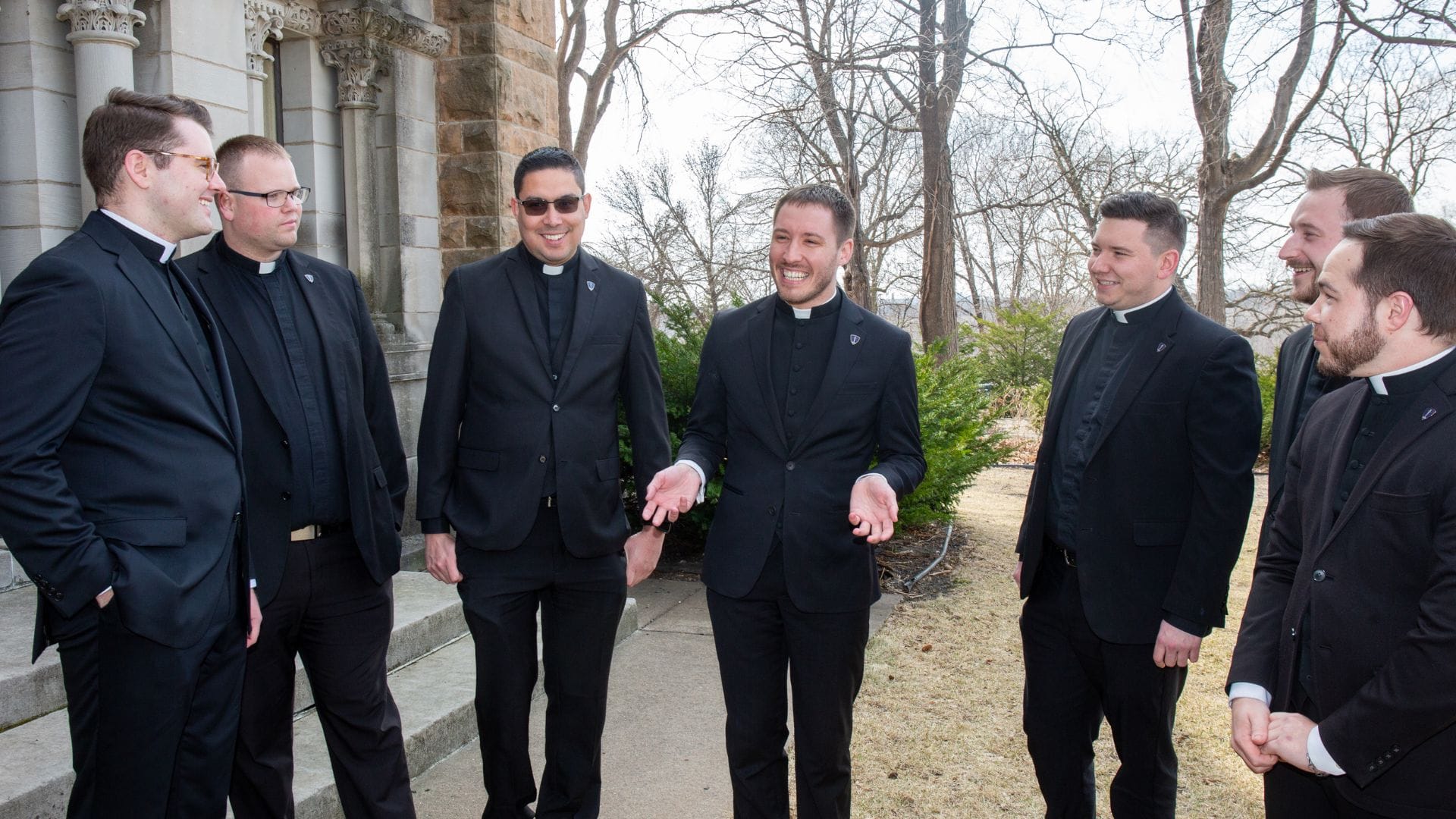 a group of seminarians hanging out and laughing together