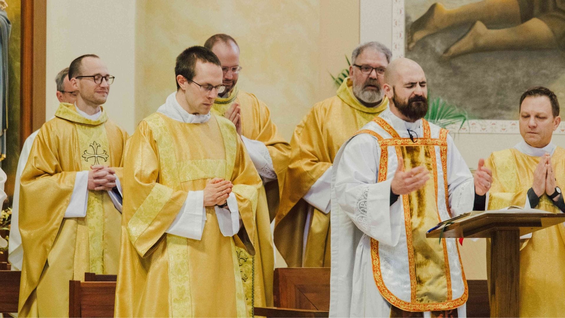 Priests celebrating Holy Mass